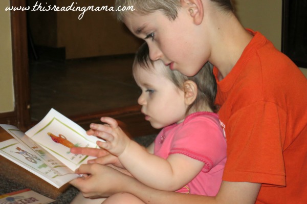 Reading Issy Books to Sister | This Reading Mama