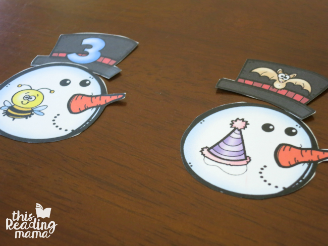 matching rhyming snowman heads to hats